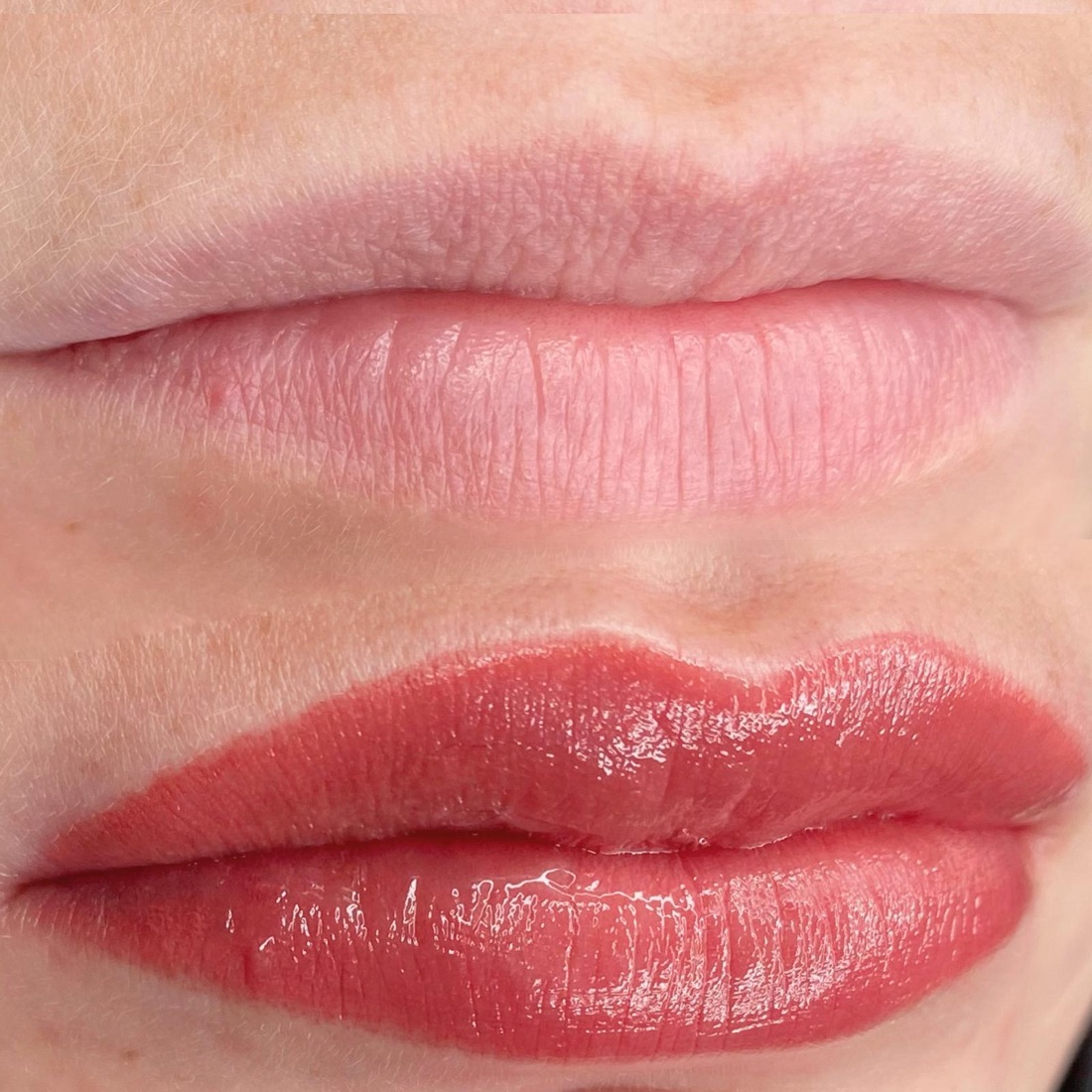 Close-up of a lip blush result with soft, natural colour and a glossy finish.